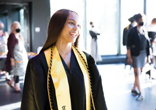 young woman graduate smiling